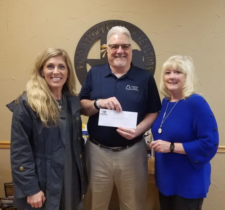 Waco Association of Realtors presenting a donation check to the Community Cancer Association