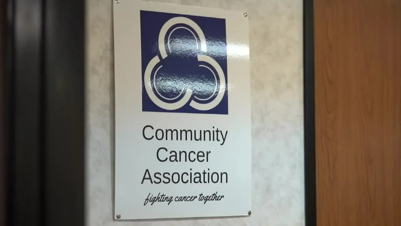 The Community Cancer Association sign outside its Waco office, reading "fighting cancer together"